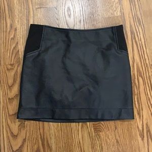 Faux leather mini skirt with stretchy sides